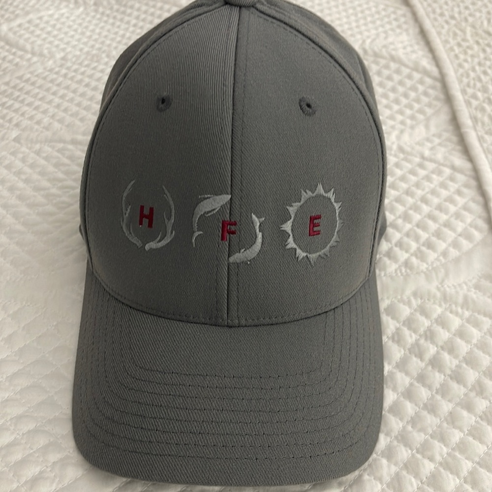 Luke Bryan Hat - never worn!  Huntin Fishin’ and Lovin’ Everyday!